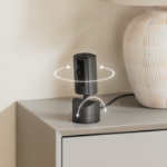 Ring Pan-Tilt Indoor Cam in black on its rotating stand